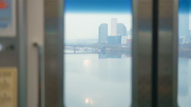 View of a city skyline through a window