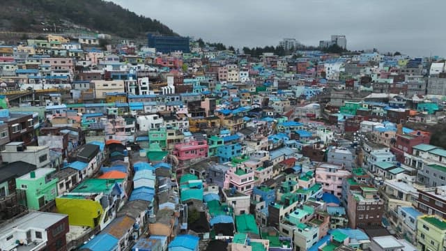 Colorful hillside village with vibrant rooftops