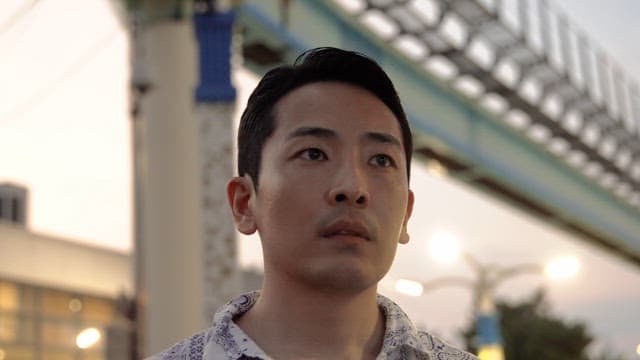 Man looking around in an urban setting