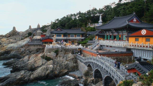Haedong Yonggungsa Temple, a popular tourist destination located on a coastal rock cliff