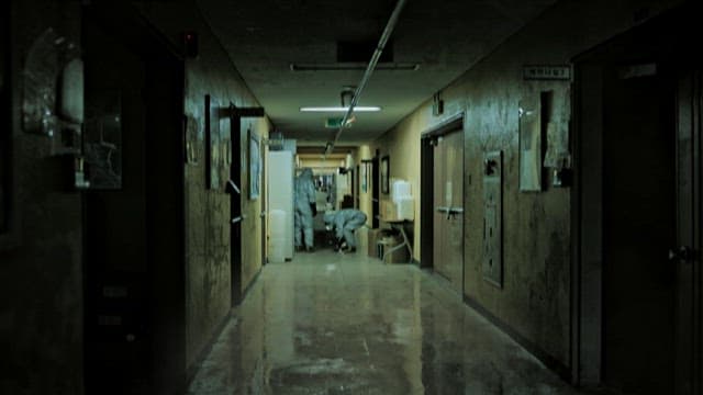 Workers Removing Explosives from Hallways