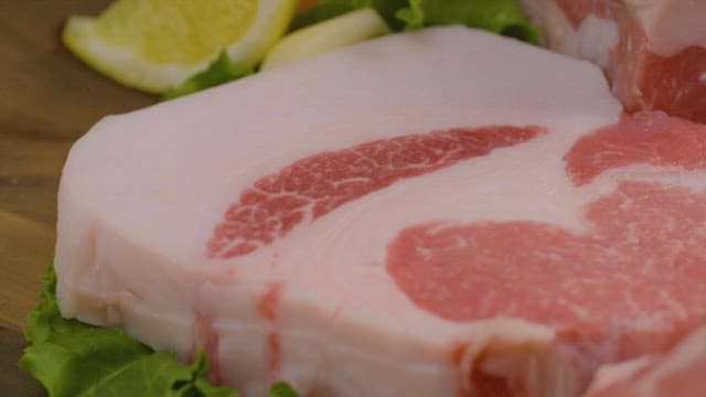 Fresh pork belly on a cutting board