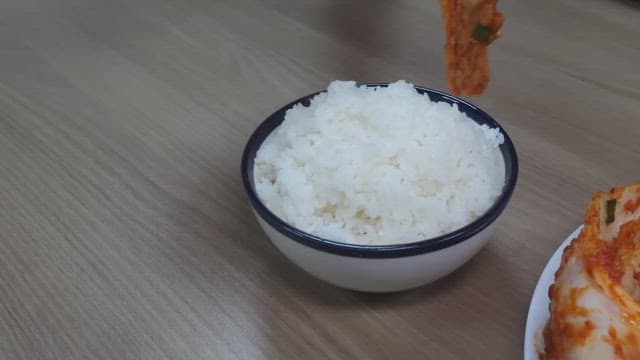 White rice topped with fresh kimchi
