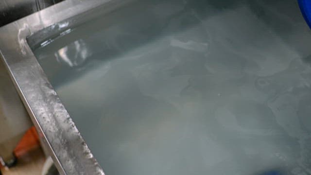 Preparing noodles in a commercial kitchen