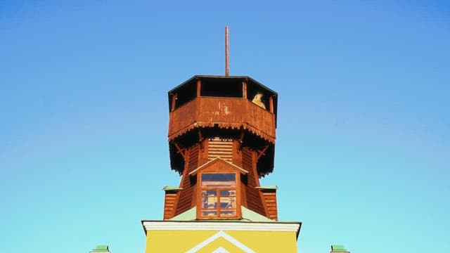 Wooden watchtower against the clear blue sky