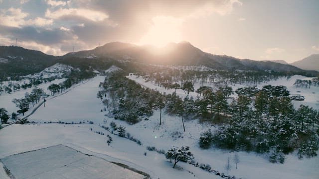 Snowy Mountain Landscape at Sunset