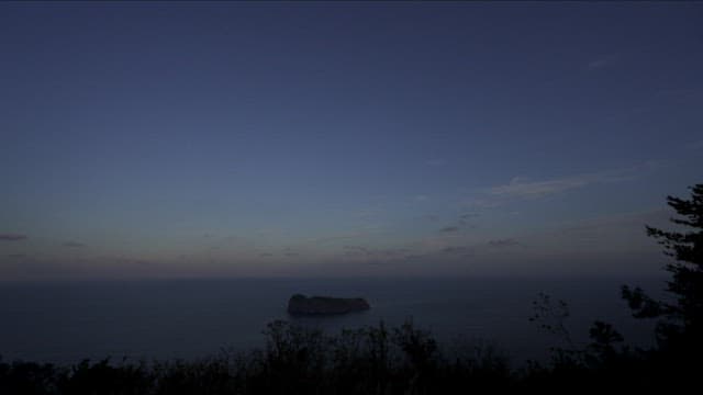 Serene Seascape View with Distant Island