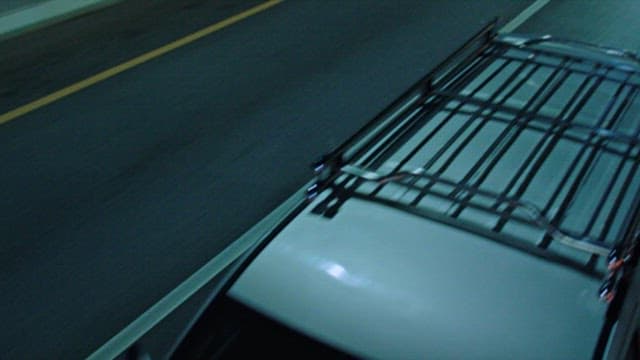 Cars Running on the Road at Night