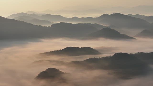 Misty Mountain Peaks at Dawn