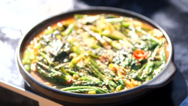 Warm and appetizing young radish and saury stew plated in a bowl