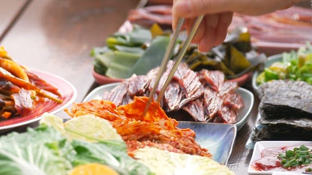 Ssam made with various vegetables served on a table