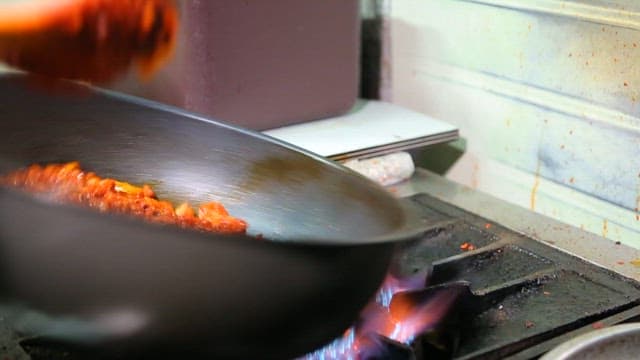 Cooking spicy pork bulgogi on the stove