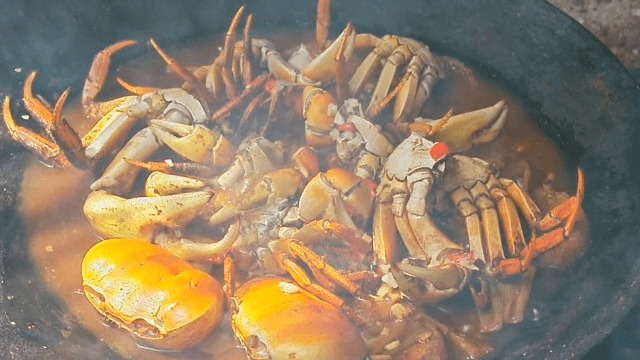 Crabs cooking in a steaming pot