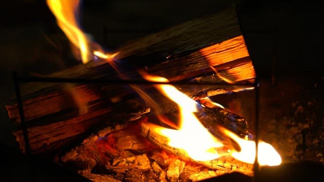 Red-hot bonfire lighting up the night