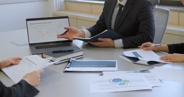 Business Professionals Analyzing Market Trends