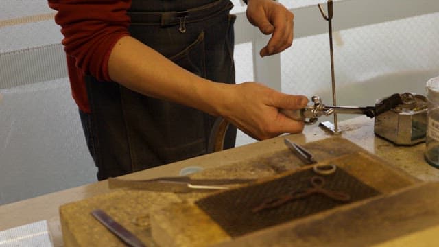 Making a Ring Using a Torch in a Workshop