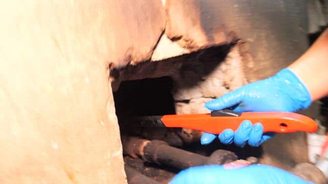 Lighting a burner in an industrial kitchen