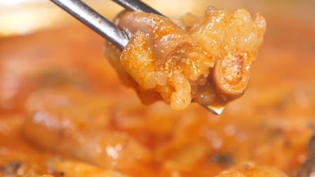Steaming hot pot of chitterlings being cooked
