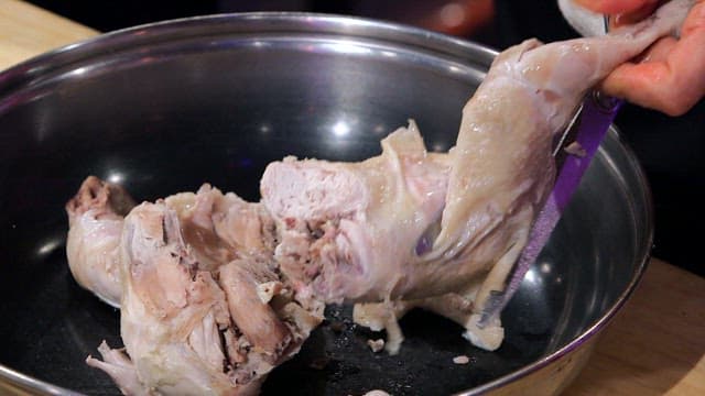 Cooked chickens in a large pot