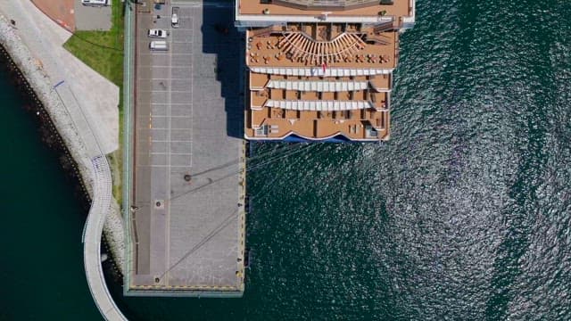 Cruise ship docked at the harbor on a sunny day