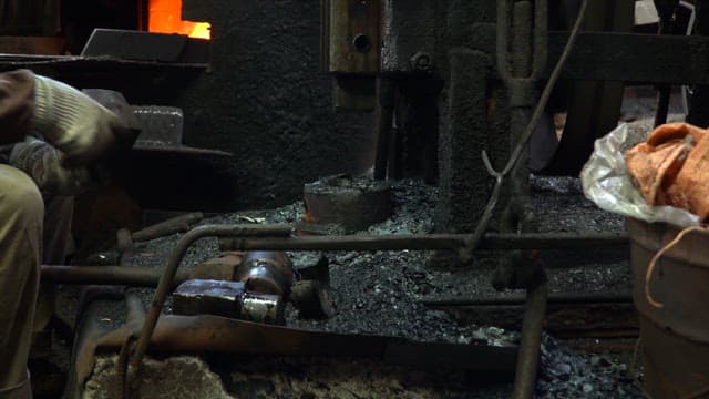 Worker operating machinery in a factory