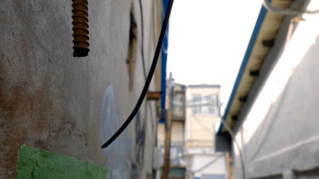 Water drop falling from pipe