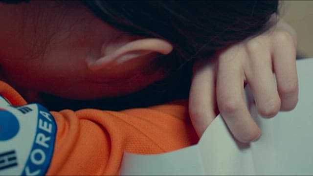 Firefighter Crying While Holding a Tissue