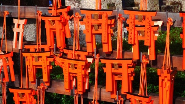 Wooden prayer plaques hanging at a Japanese shrine