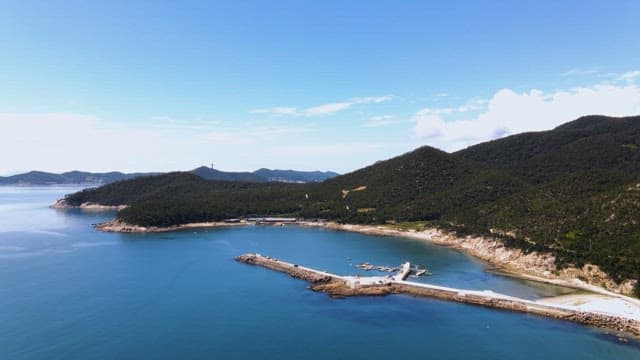 Peaceful coastal landscape with a pier