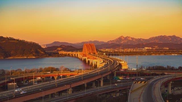 Bridge over a river at sunset
