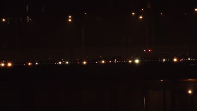 Late night train passing through the city