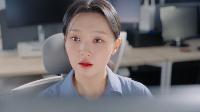 Woman focused on her work at the office