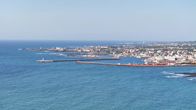 Coastal city with a view of the sea