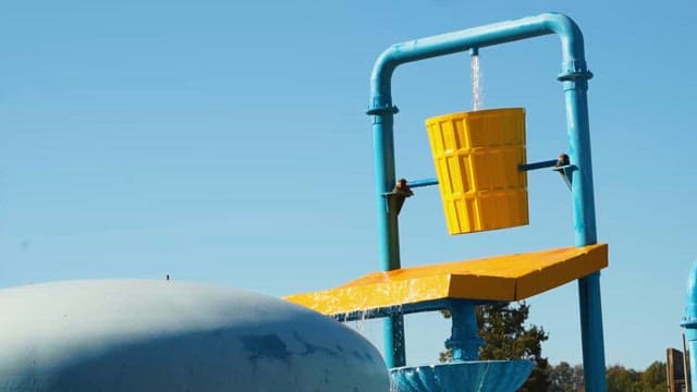 Attraction Using a Drop in a Water Park