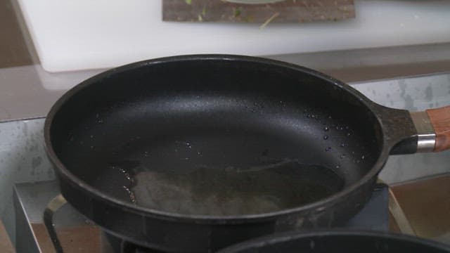 Stir-frying vegetables in a hot pan