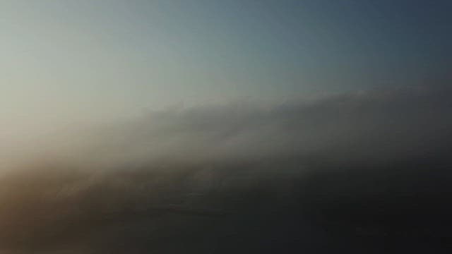 Morning mist over a coastal town