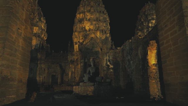 Night of Buddha Statue in Ancient Majestic Stone Temple