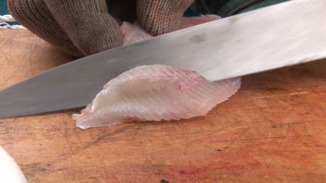 Person who prepares fresh sashimi