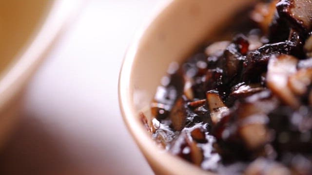 Bowl of savory thick black bean sauce