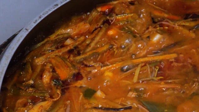 Red soup boiling in a gamasot