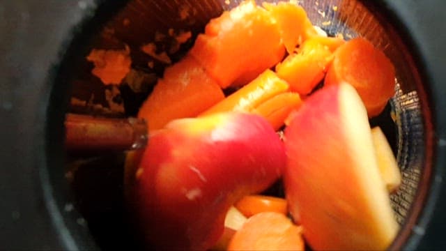 Fresh Fruits and Vegetables Juice Being Prepared at Home