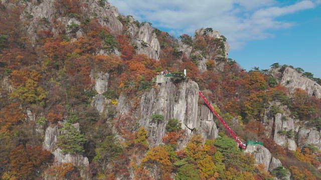Scenic autumn mountain with hikers