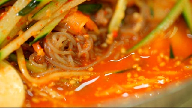 Spicy cold buckwheat noodles with cucumbers and egg