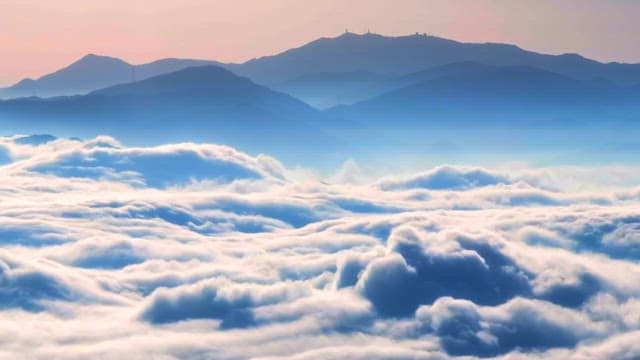 Mountains and clouds at sunrise