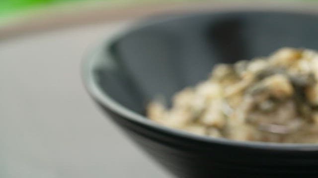 Spoonful of rice with fresh dried radish greens