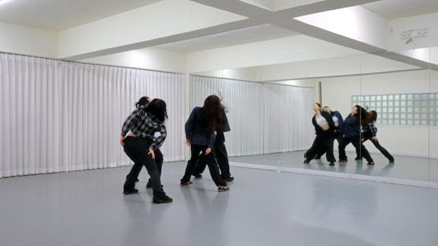 K-POP Dancers Practicing in a Studio