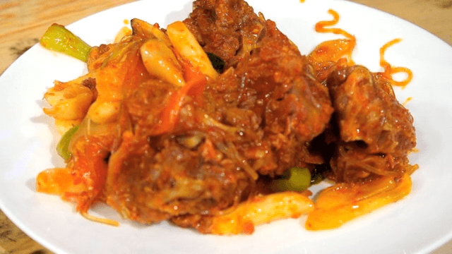 Spicy braised pork backbone served on a plate