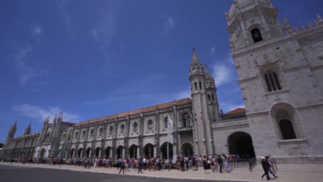 Crowded Square Outside a Historic Cathedral