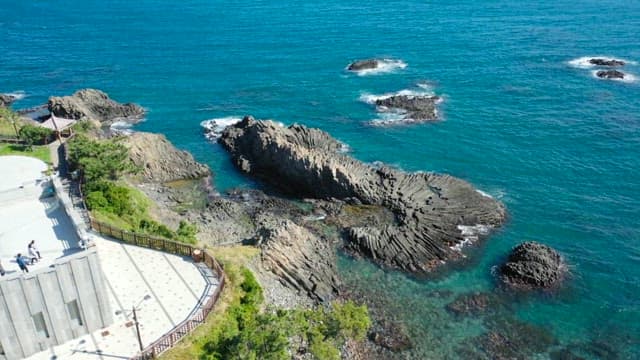 Rocky coast on a sunny day with columnar joint