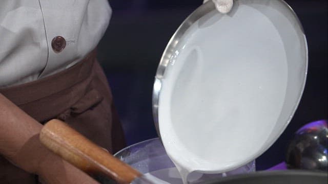Starch batter pouring onto a tray